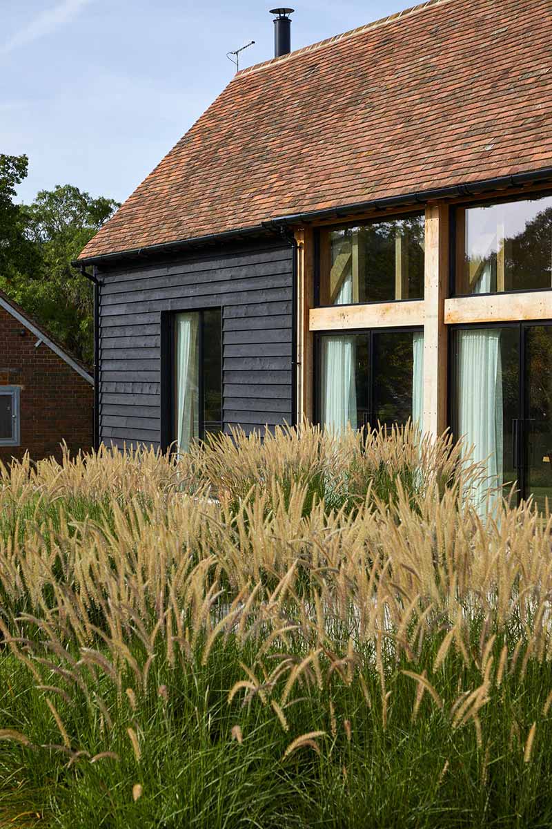 barn with meadow planting foreground